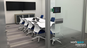 Eastman Corporate Business Center meeting room with Cobi chairs and Room Wizard by Steelcase