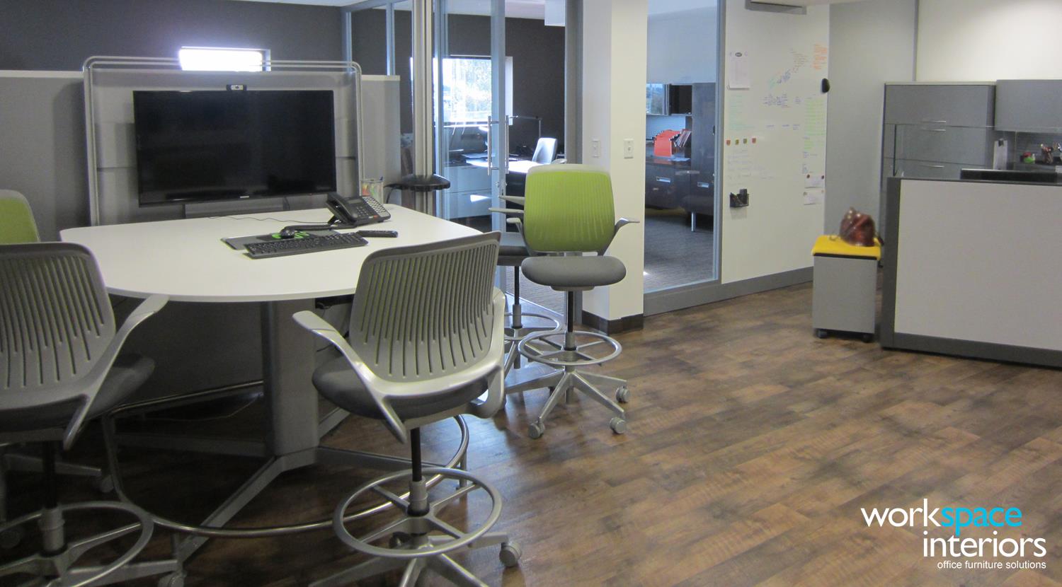 3 Minute Magic Car Wash collaboration area featuring Mediascape table and Cobi stools by Steelcase