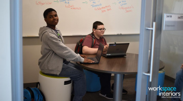 Dobyns-Bennett High School Excel breakout room with a students sitting on a Buoy active seating stool by Turnstone