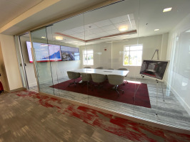 Tevet conference room with Steelcase architectural walls West Elm Work Nimbus lounge chairs