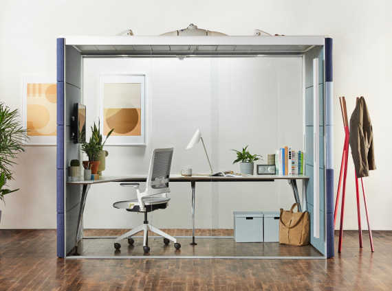 small office area within a privacy pod
